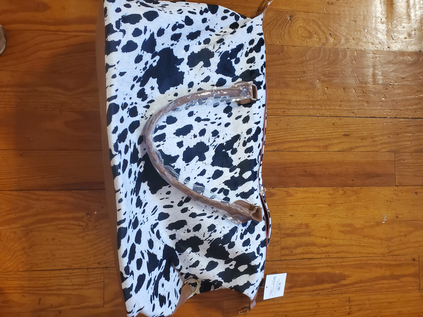 Cow print weekender bag